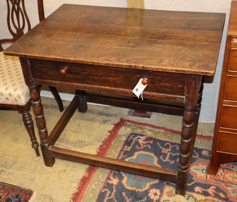 An 18th century rectangular oak side table fitted drawer on bobbin-turned supports, W.86cm, D.60cm, H.70cm
